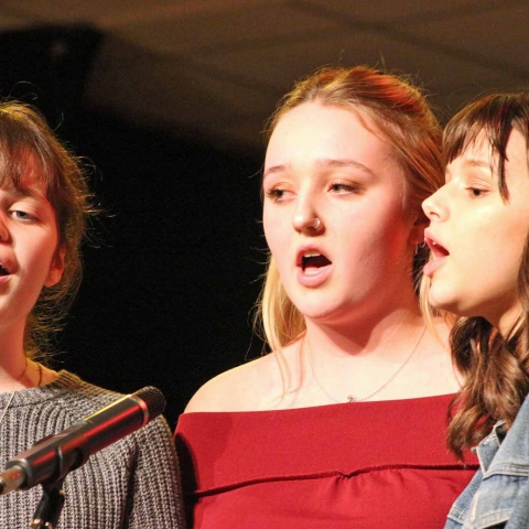 Pictured from left performing at the Acoustic Night are Holly Higlett, Beth Wilson and Sophie Westwood