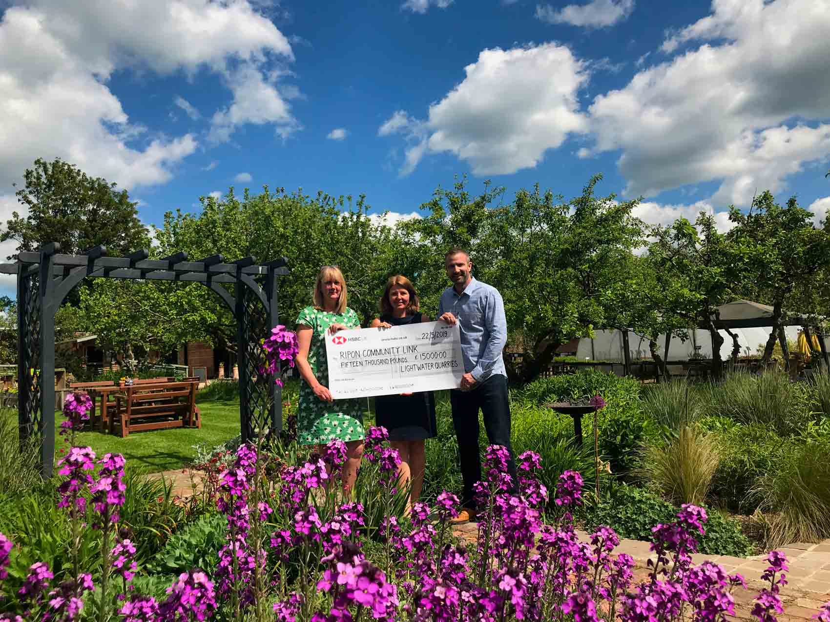 Generous Donation! James Staveley is pictured in the Walled Garden with Ripon Community Link chief executive Victoria Ashley, centre, and Ripon Community Link chair of trustees, Kathryn Harrison