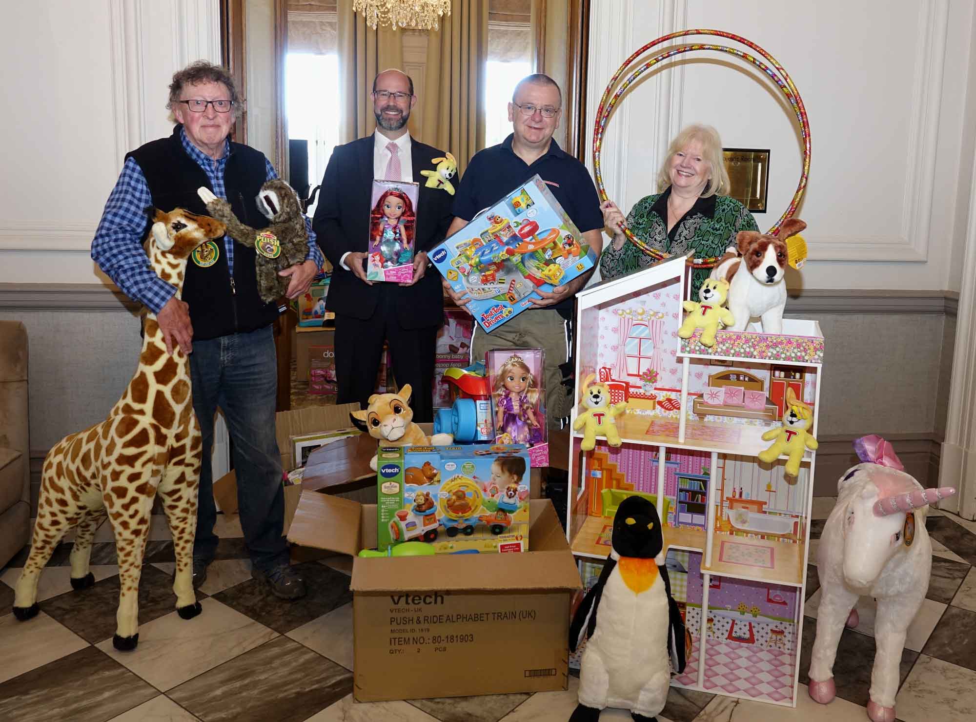 Bob Burns, Majestic Hotel general manager Matthew Hole, Toymaster managing director Ian Edmunds, and Maureen Burns