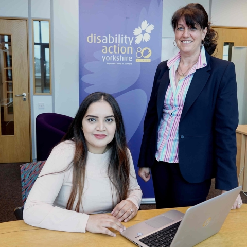 Disability Action Yorkshire entrepreneur coach Iram Khan, seated, with Denise Baynton, Disability Action Yorkshire’s training operations manager