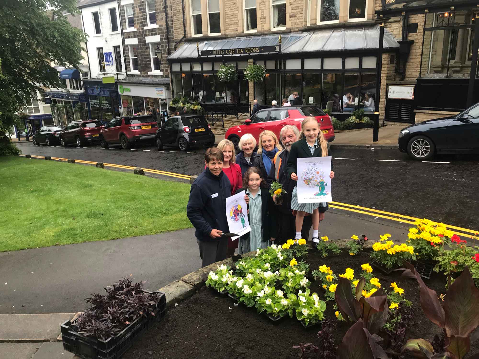 pictured is Head Teacher Nicola Matthews, Horticultural Officer Sue Wood and Gardener Richard Gilbert along with Pam Grant, President of Harrogate in Bloom and Fiona Fisk of competition sponsor Harrogate Flower Shows