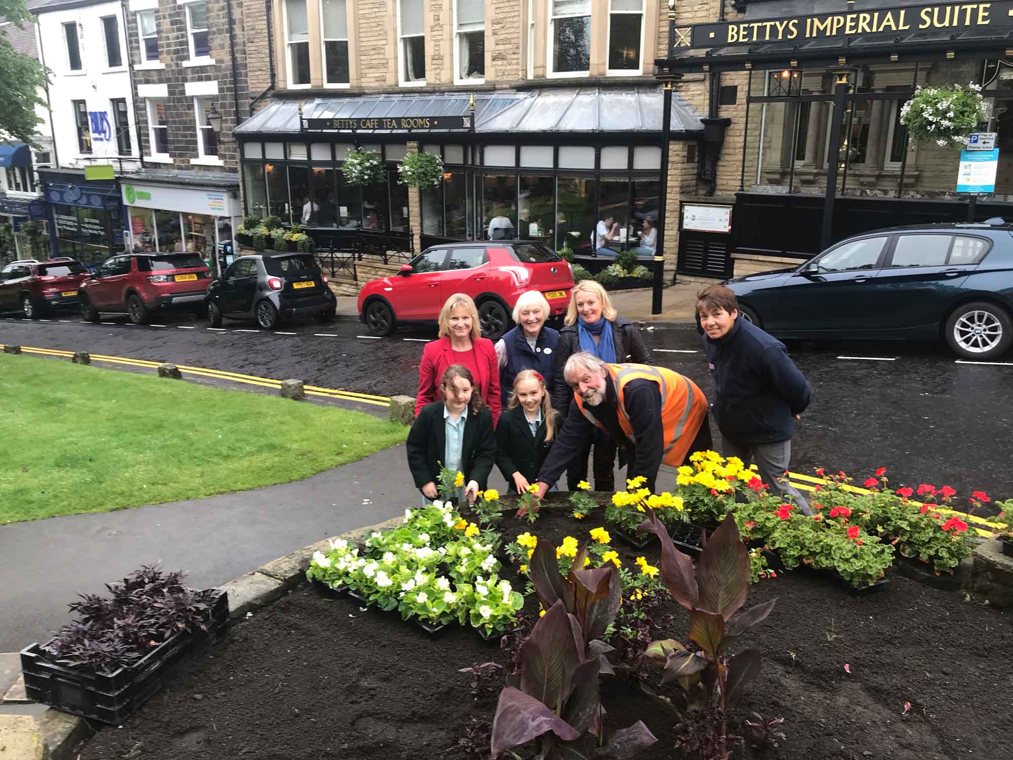 pictured is Head Teacher Nicola Matthews, Horticultural Officer Sue Wood and Gardener Richard Gilbert along with Pam Grant, President of Harrogate in Bloom and Fiona Fisk of competition sponsor Harrogate Flower Shows
