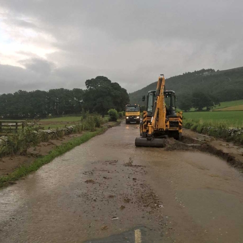 North Yorkshire County Council highways team working to remove debris from the road