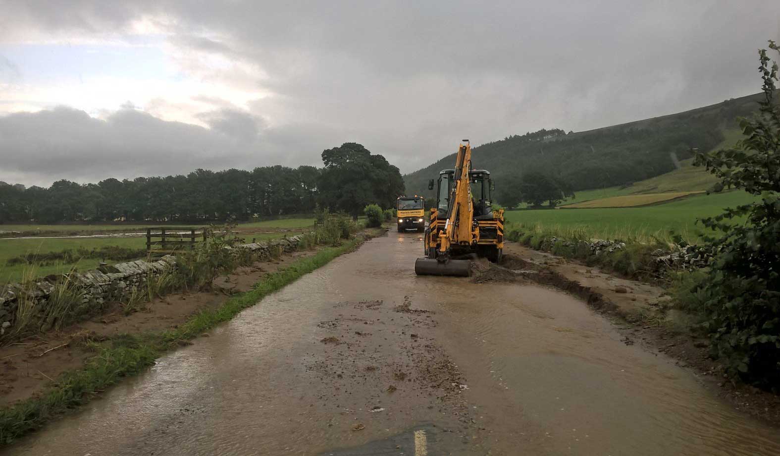 North Yorkshire County Council highways team working to remove debris from the road