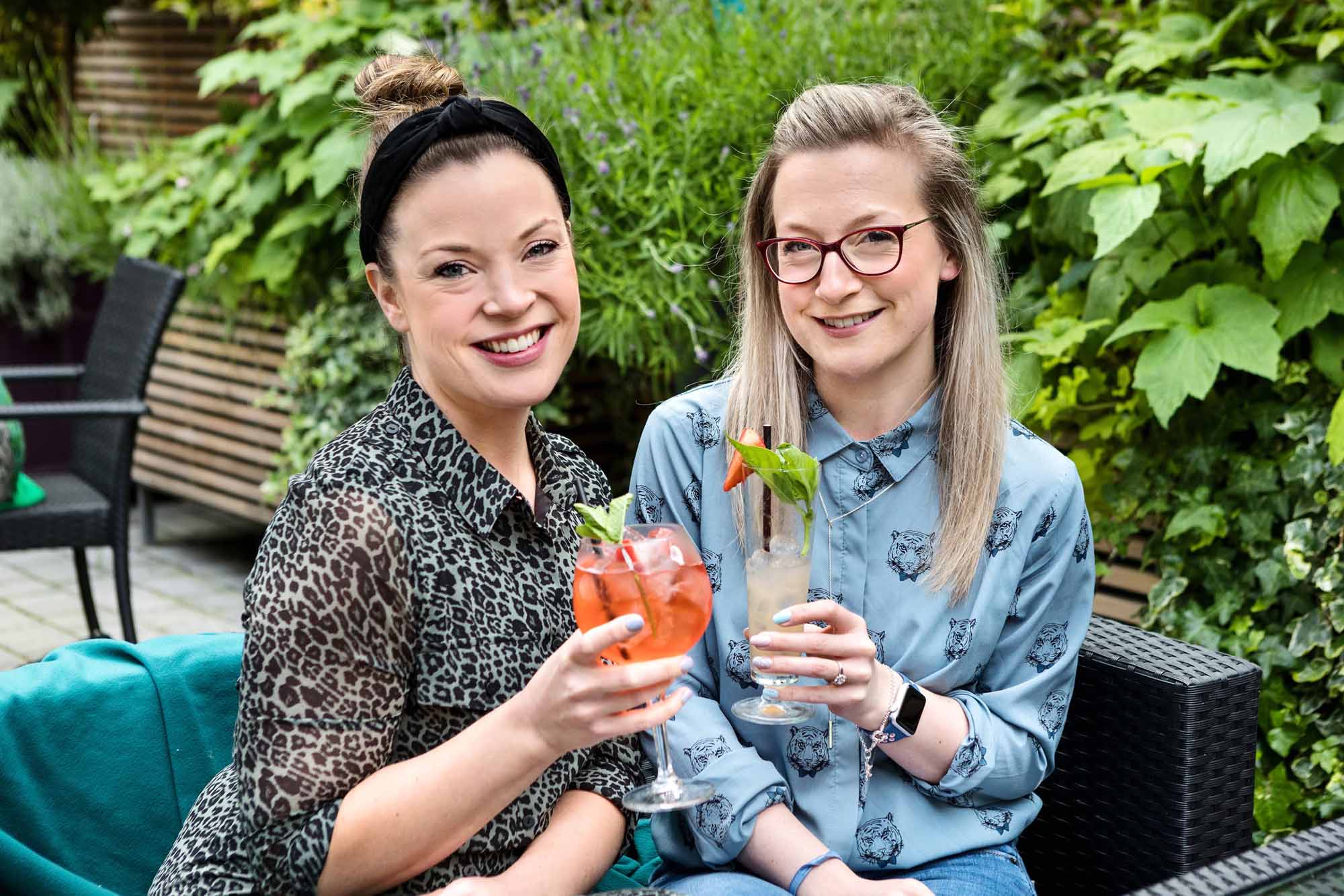 Jo Pollitt and Steph Starkings outside on the terrace