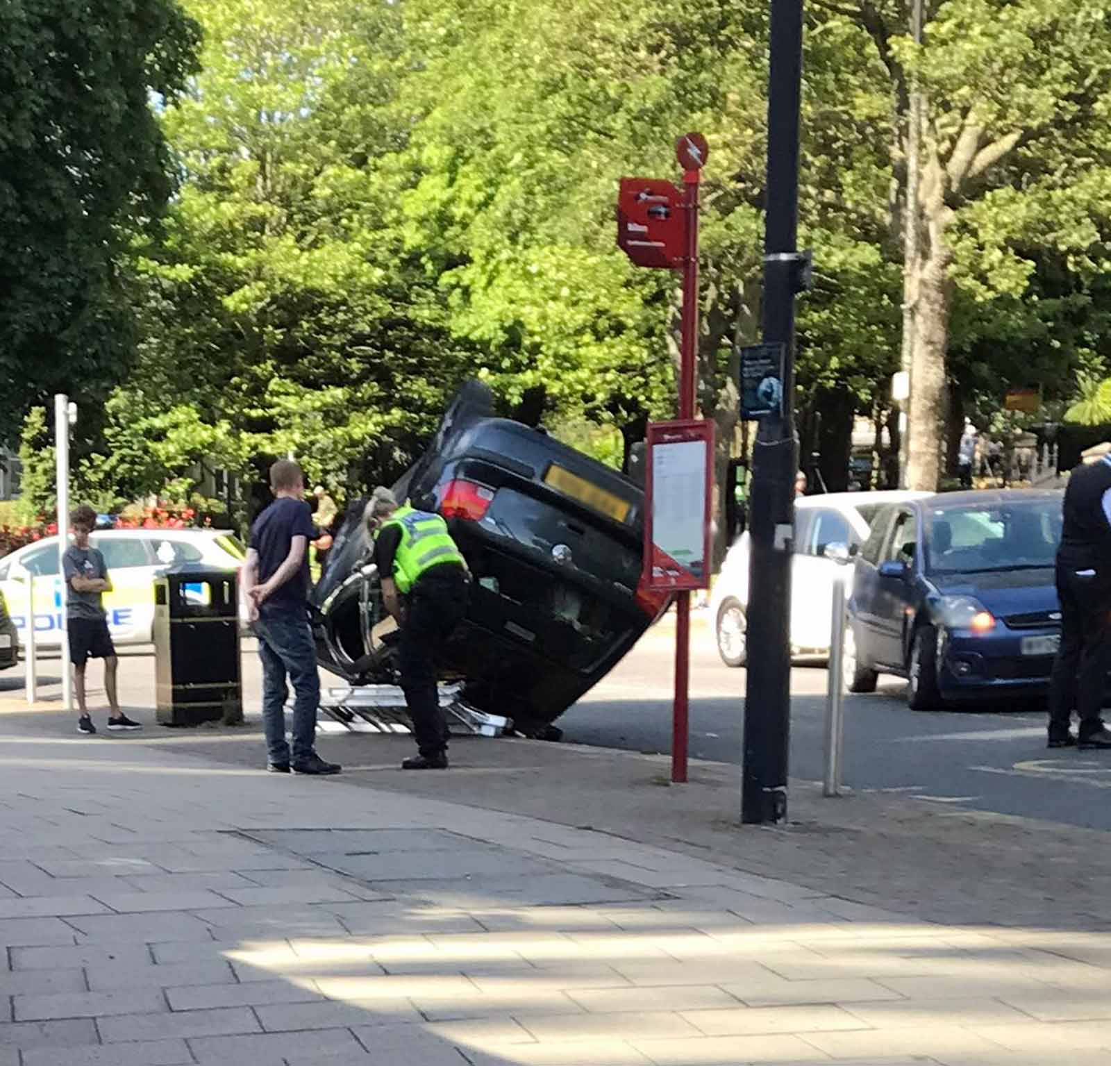 Car ends up on roof following collision