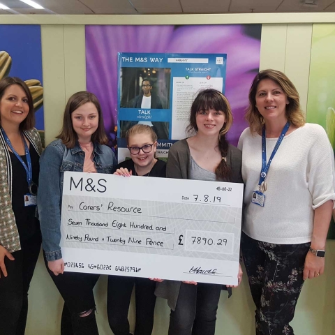 Anne Wells, young carer worker Sarah Beard, young carers Madi, Amelia, Freya and Helen, and Holly Hawthorne, charity co-ordinator M&S Harrogate