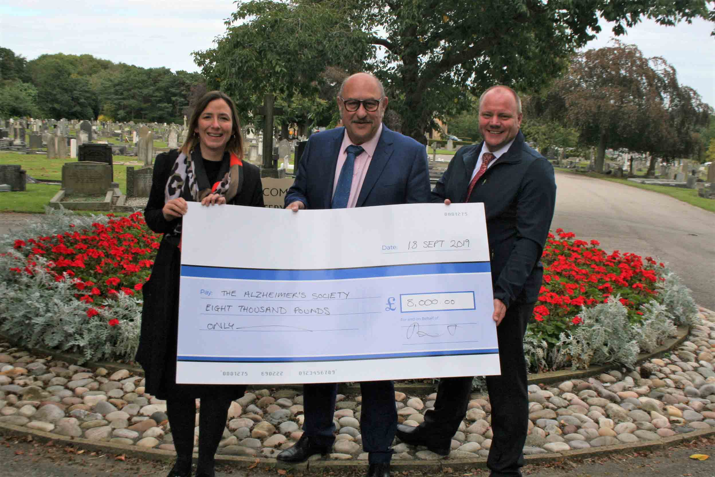 Leah Bull from Alzheimer’s Society with Councillor Andy Paraskos and Stephen Hemsworth from Harrogate Borough Council