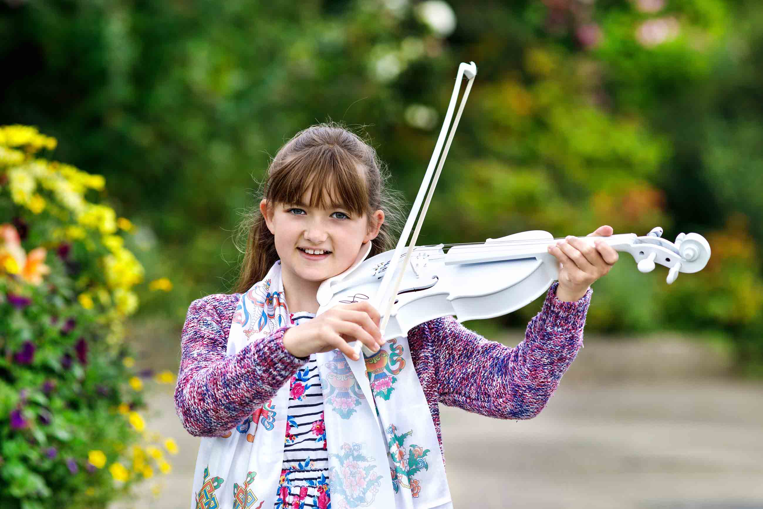 Local schoolgirl Jessica Hepworth playing Sam Smith’s violin