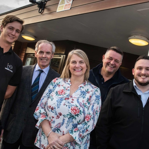 In front of part of the CCTV system are (from left) Louis Dawson, Cllr Don Mackenzie, headteacher Linda Mortimer, David Barclay and Matt Houston