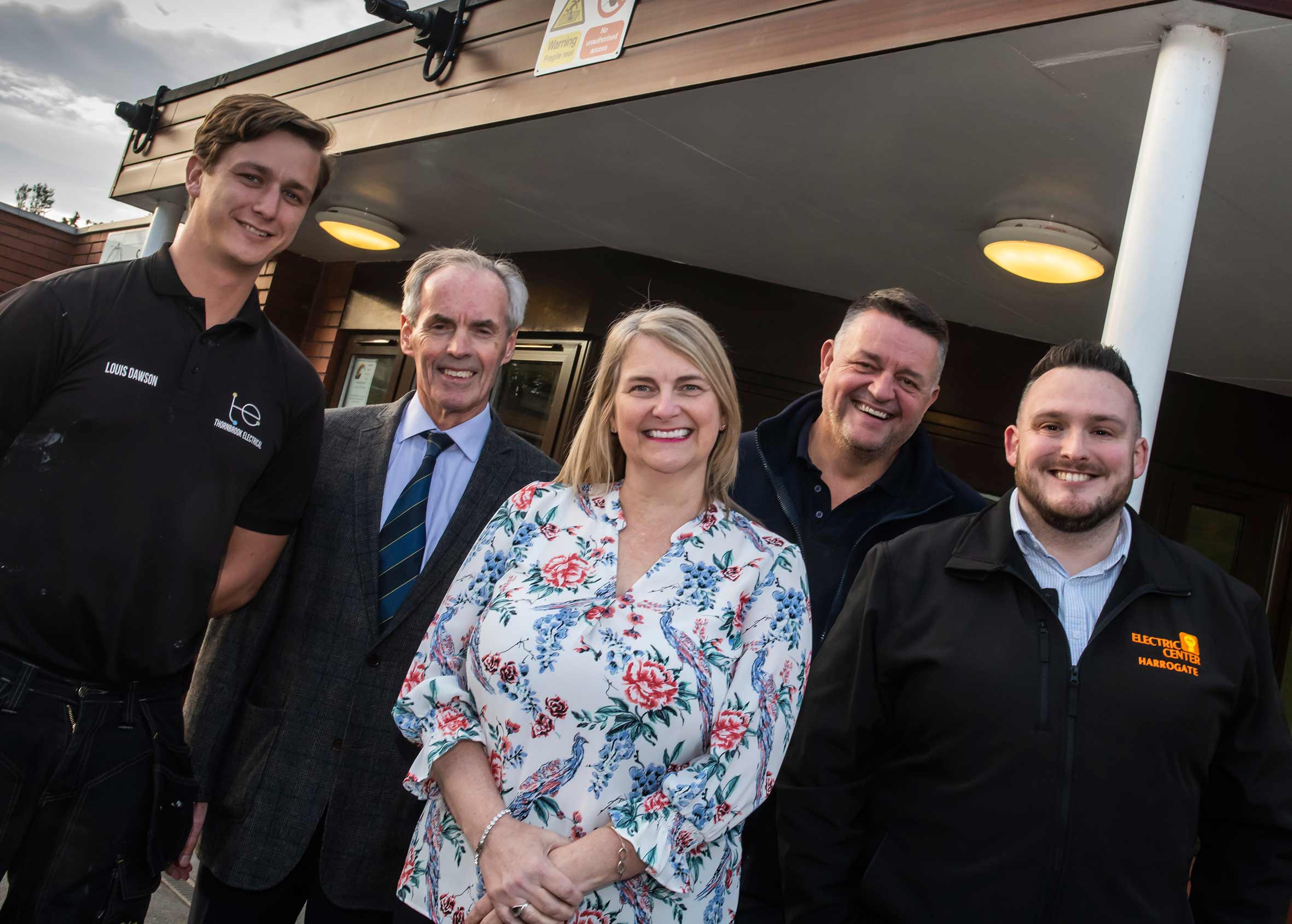 In front of part of the CCTV system are (from left) Louis Dawson, Cllr Don Mackenzie, headteacher Linda Mortimer, David Barclay and Matt Houston