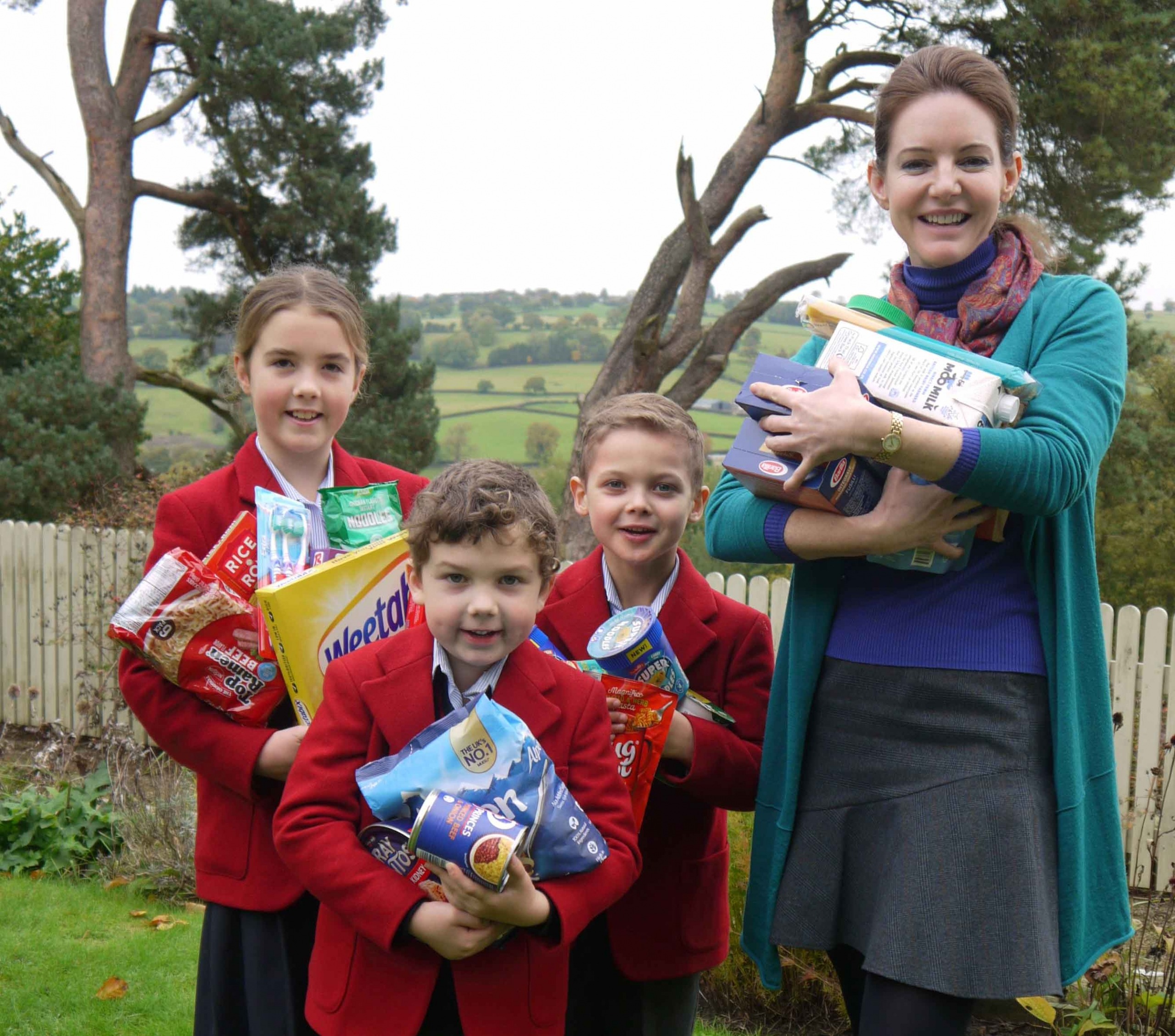 Belmont Grosvenor Headmistress Sophia Ashworth Jones with pupils (L to R) Katy Thody and Ben Madsen and Harry McDonnell