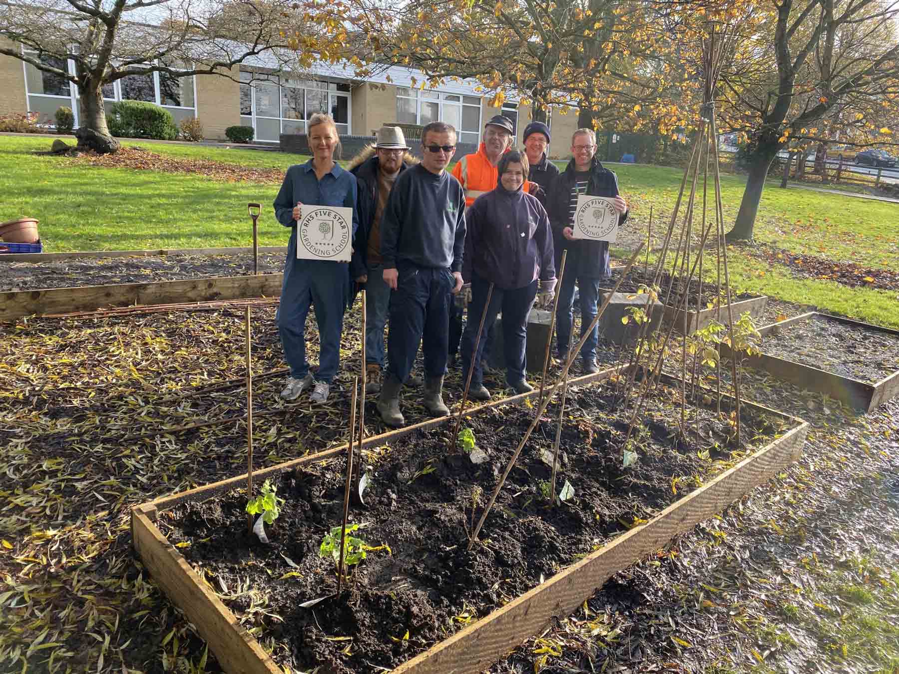 Sam Wright, Teaching Assistant, M: Members from Horticap, R: Dan Cawte, Deputy Head Teacher