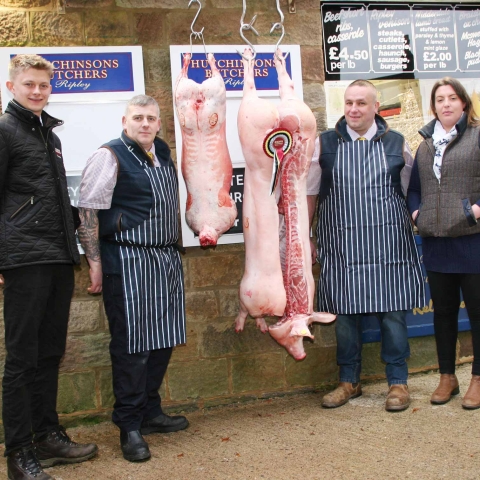 Pictured at Hutchinsons Butchers with some of the prize-winning prime meat purchased for customers Christmas’ tables at Skipton Auction Mart are, from left, the mart’s junior auctioneer Kyle Hawksworth, who sold the pigs, Hutchinsons head butcher Brian Robinson, Dave Kirby and Alison Kay. If using pics, please credit Moule Media, Skipton