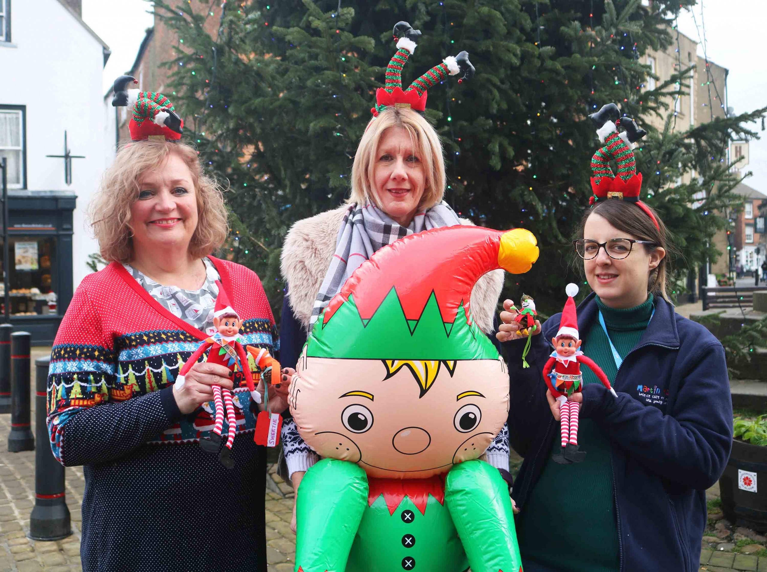 (From left) Hairdresser Jil Long, Karen Kharfallah of The Sweet Cabin and Emily McCabe, assistant manager at the Martin House Charity Shop