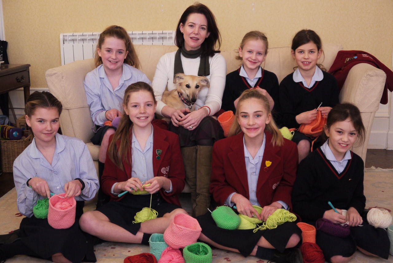 Headmistress Mrs Sophia Ashworth Jones, school dog Zola and Belmont Grosvenor School pupils