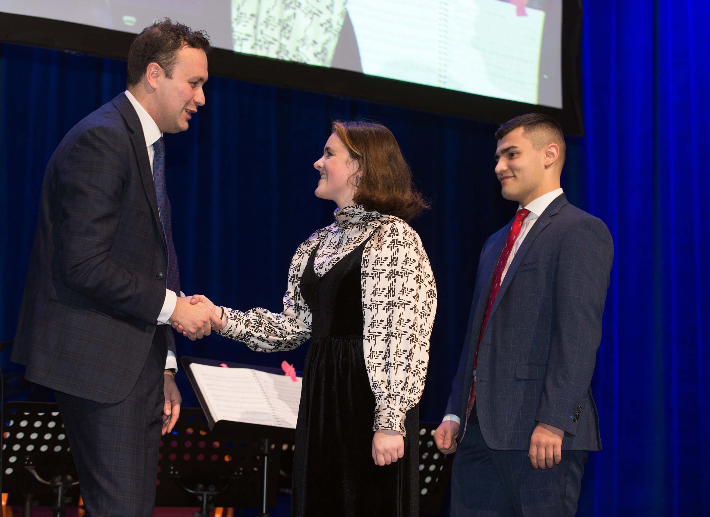 Headteacher, Neil Renton, presenting awards to Head Students, Phoebe Kyriakopoulos and Joe Nichols