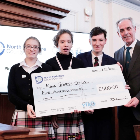 King James's School pupils Sarah Woodlands-Mooney, Sam Morris and Brandon Hancock receiving their cheque from Cllr Don Mackenzie