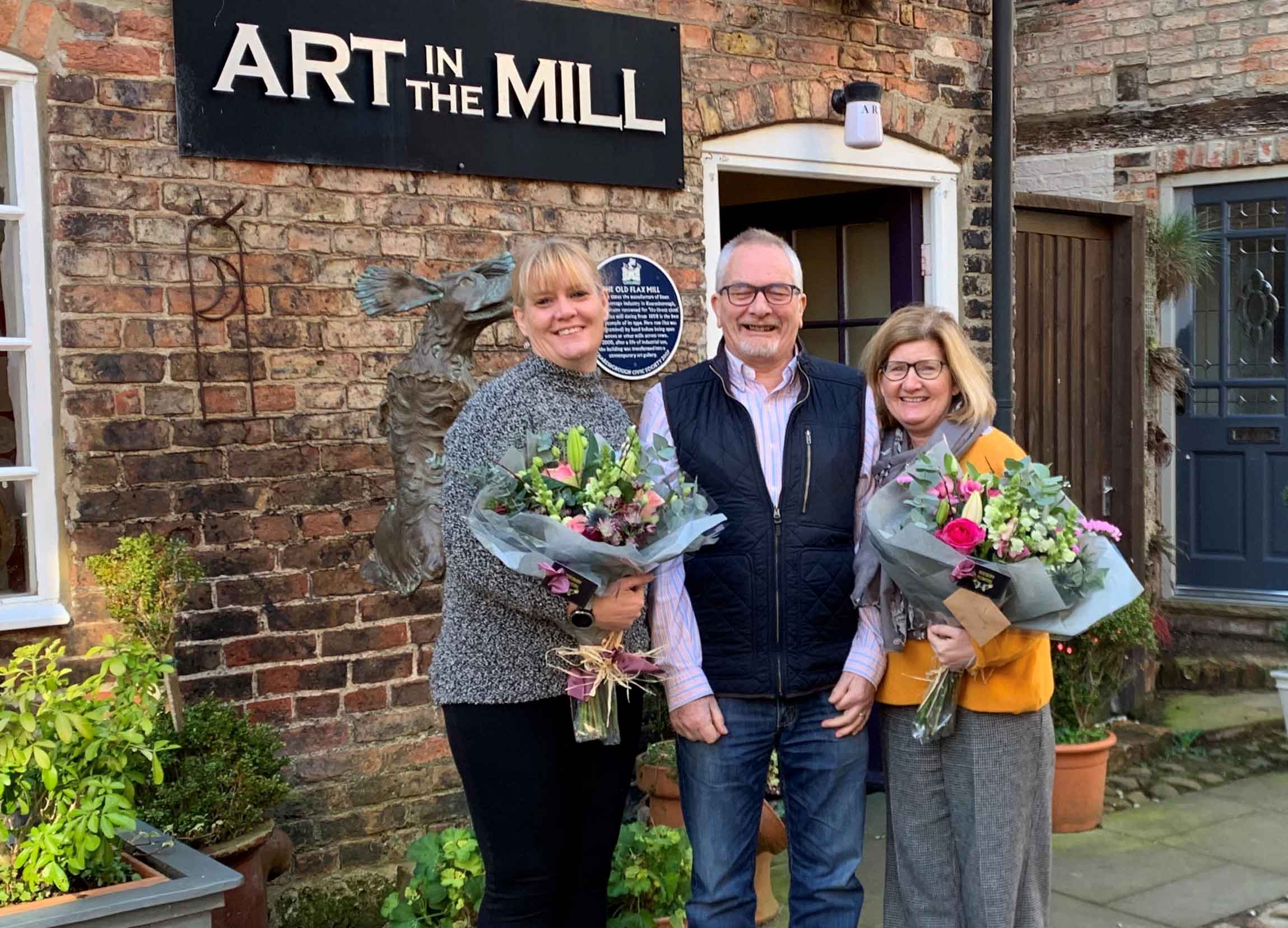 retiring feva committee members Sue Holden, left, and Elaine Grinter, right, with Barry Blake