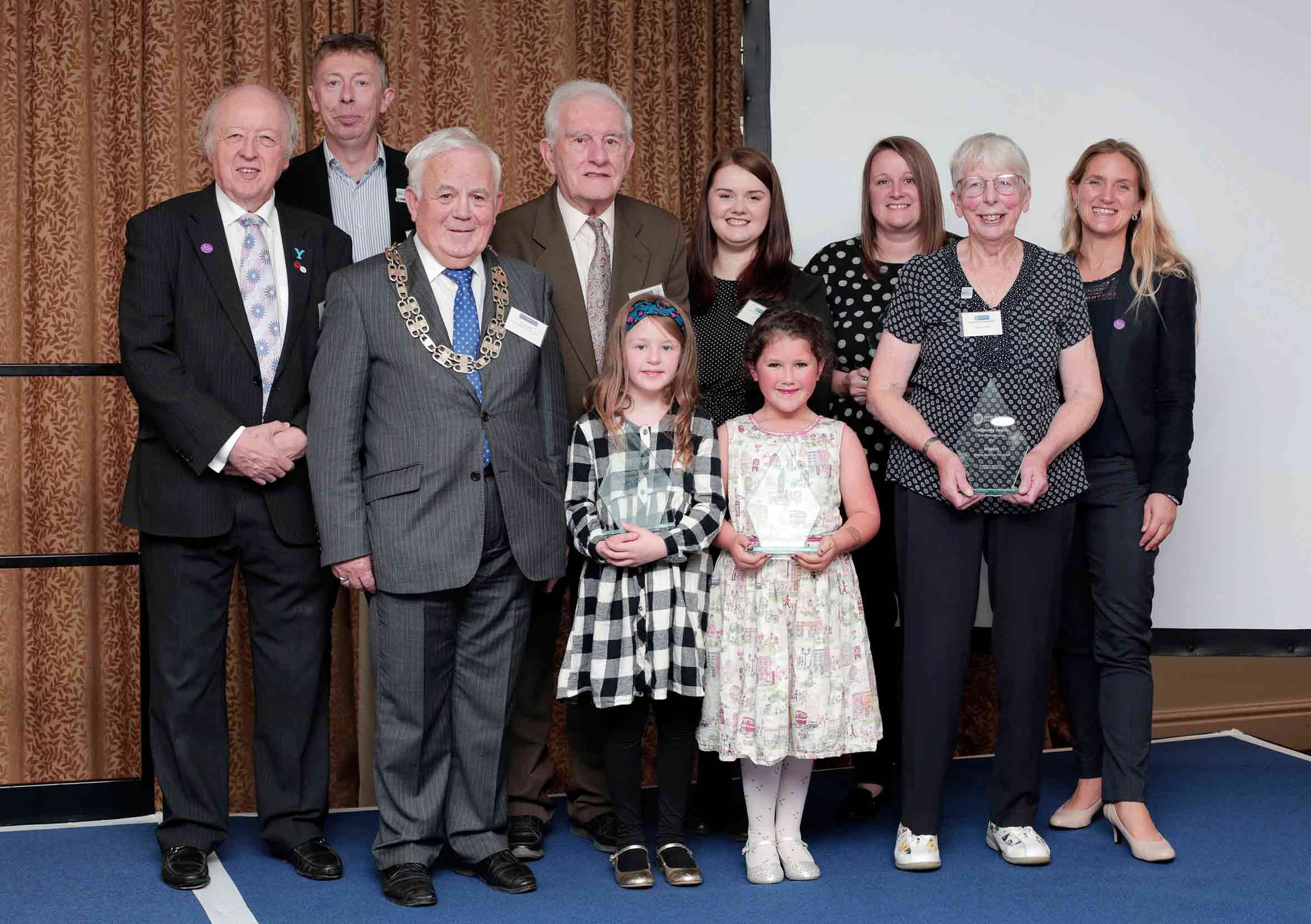 County Council leader Cllr Carl Les (far left) and chairman Cllr Jim Clark (third left) with Community Award winners 2019