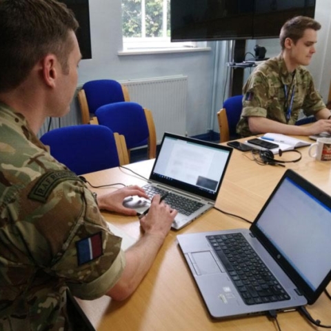 Flying Officer Sam Watson and Flight Lieutenant Graham Ivison working during the pandemic