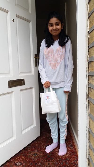 Young carer Imaan, of Keighley, with her Bake Off kit