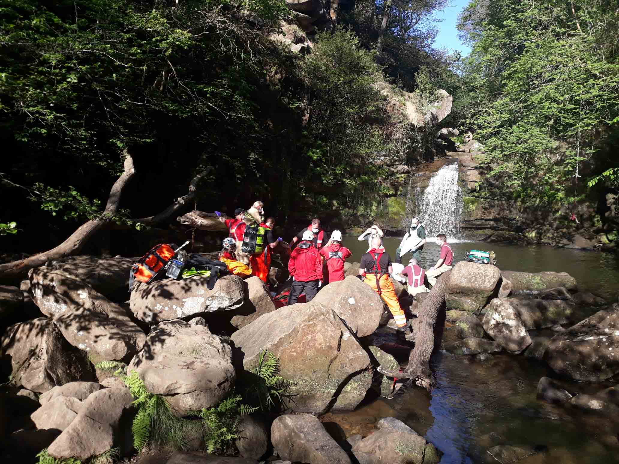 emergency services and volunteer rescue teams at the scene of the incident at Thomason Foss