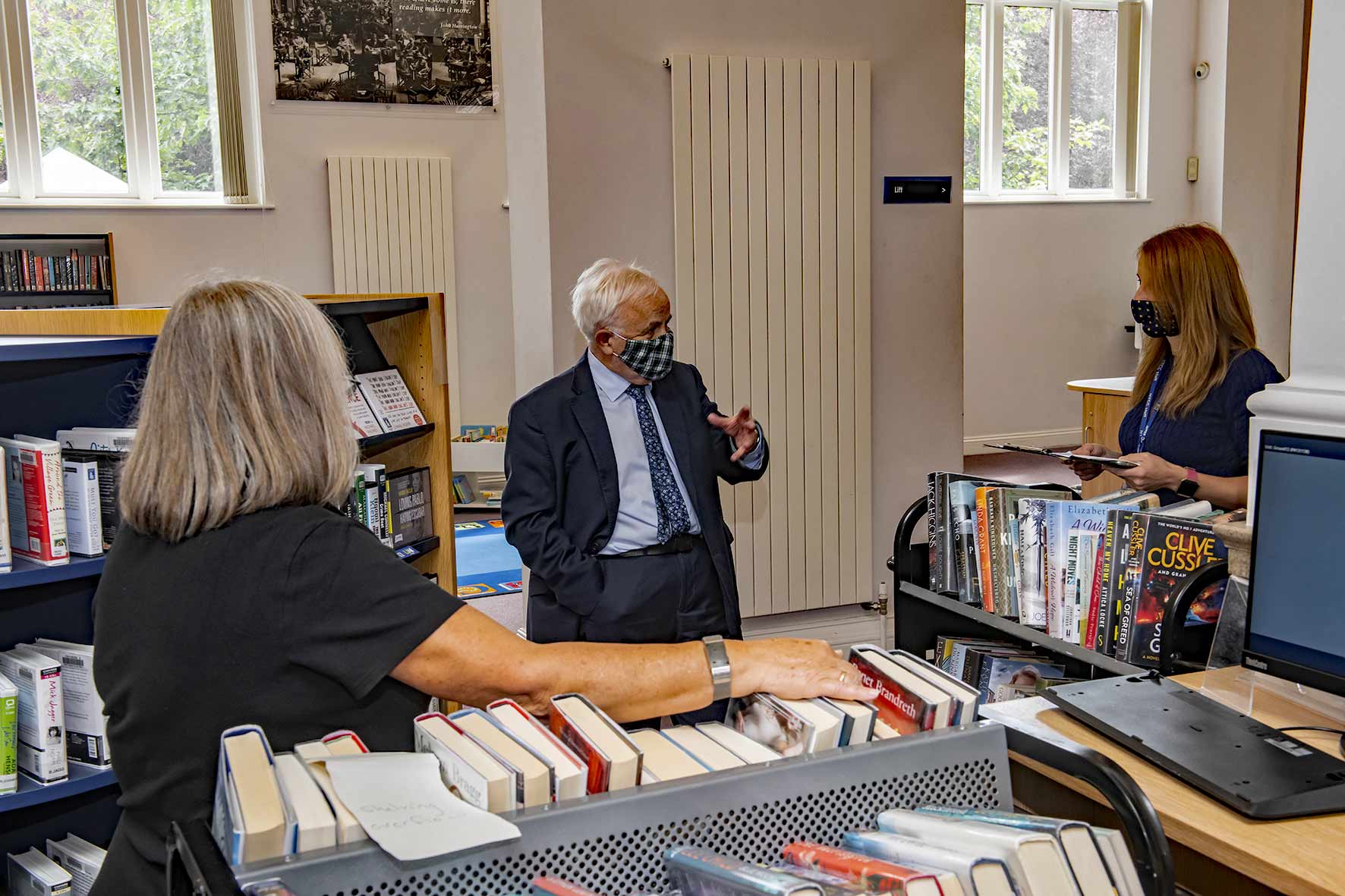 Cllr Jim Clark with library supervisor Hollie Simpson and volunteer Lesley Hidden