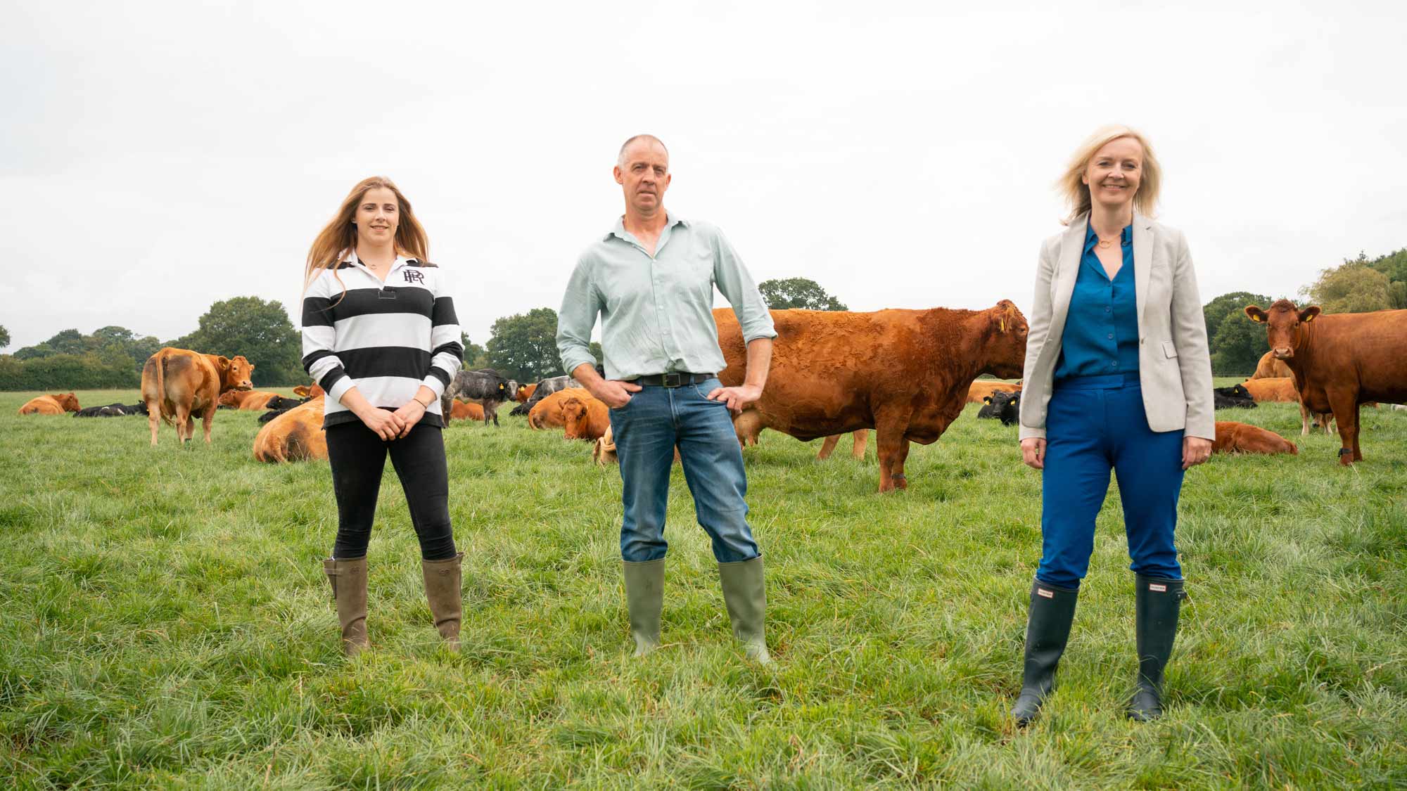 Rosie Powley and Mike Powley (daughter and father), from Oak House Farm, and Liz Truss, International Trade Secretary