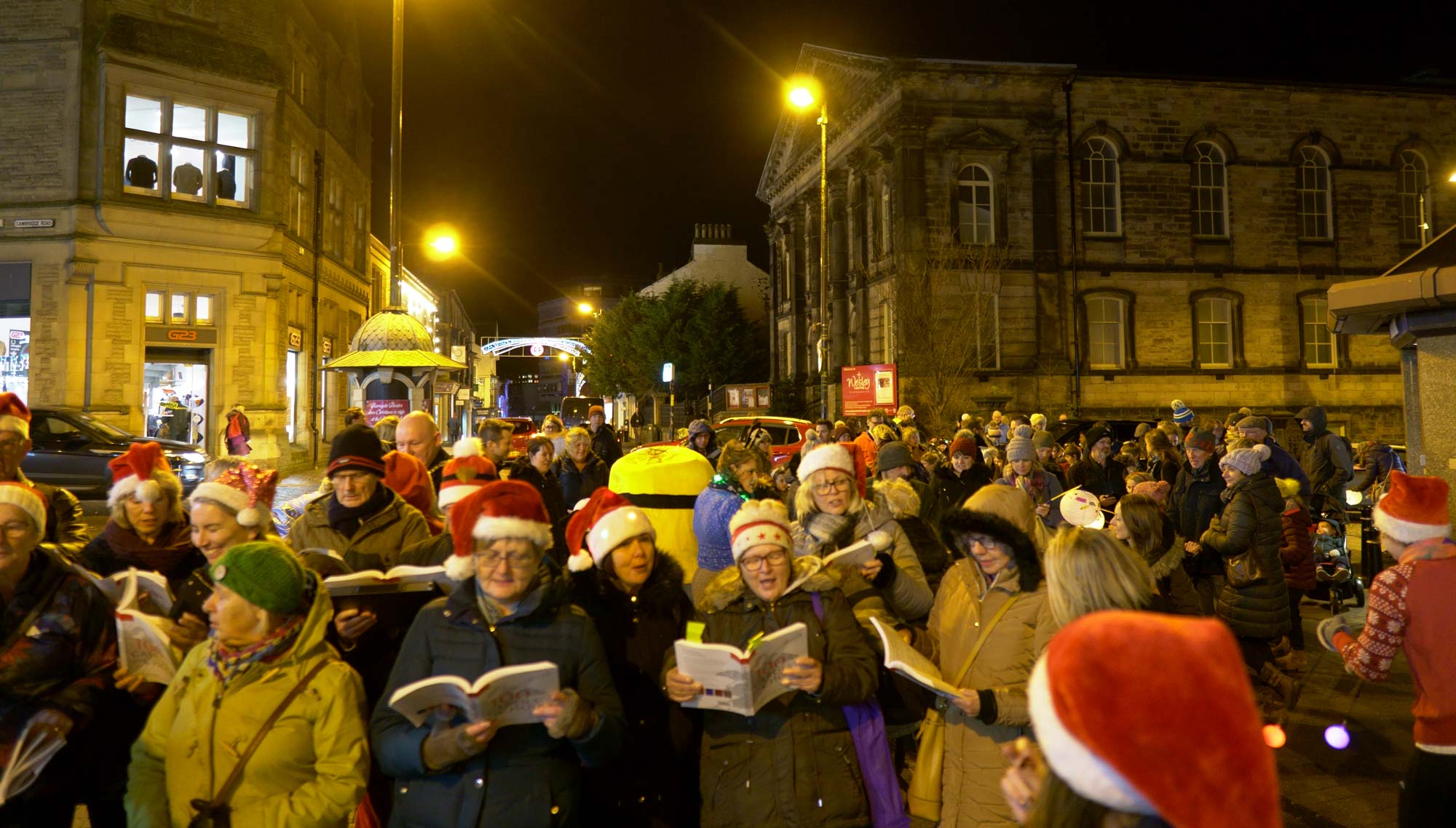 Reincantation Choir preparing to lead the Harrogate at Christmas Lantern Parade from Wesley Church last year