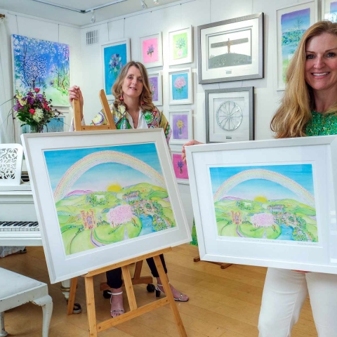 Artist Anita Bowerman, left, and Continued Care’s director Samantha Harrison at The Dove Tree Art Gallery and Studio in Harrogate with the ‘Rainbow of Hope’ painting