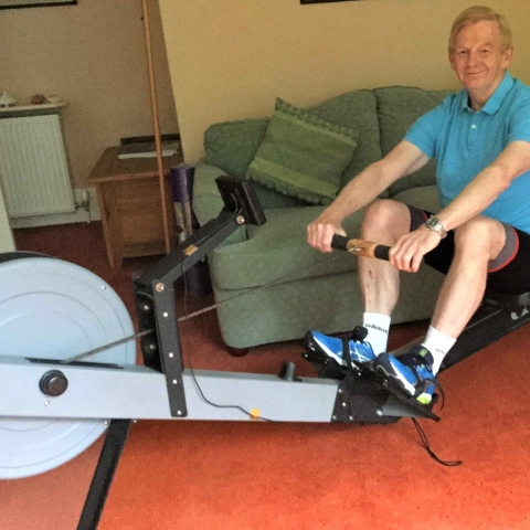 David Russell rows the miles in his living room