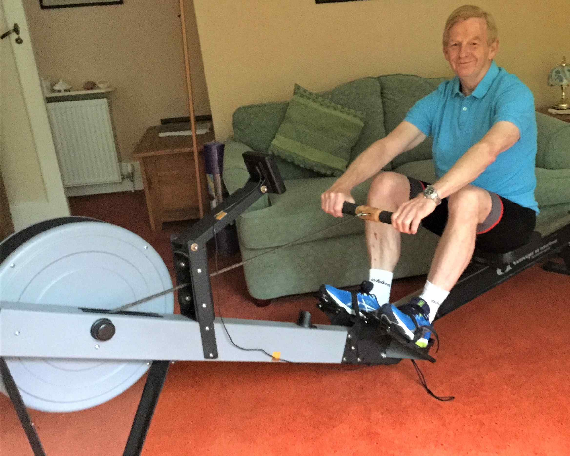 David Russell rows the miles in his living room