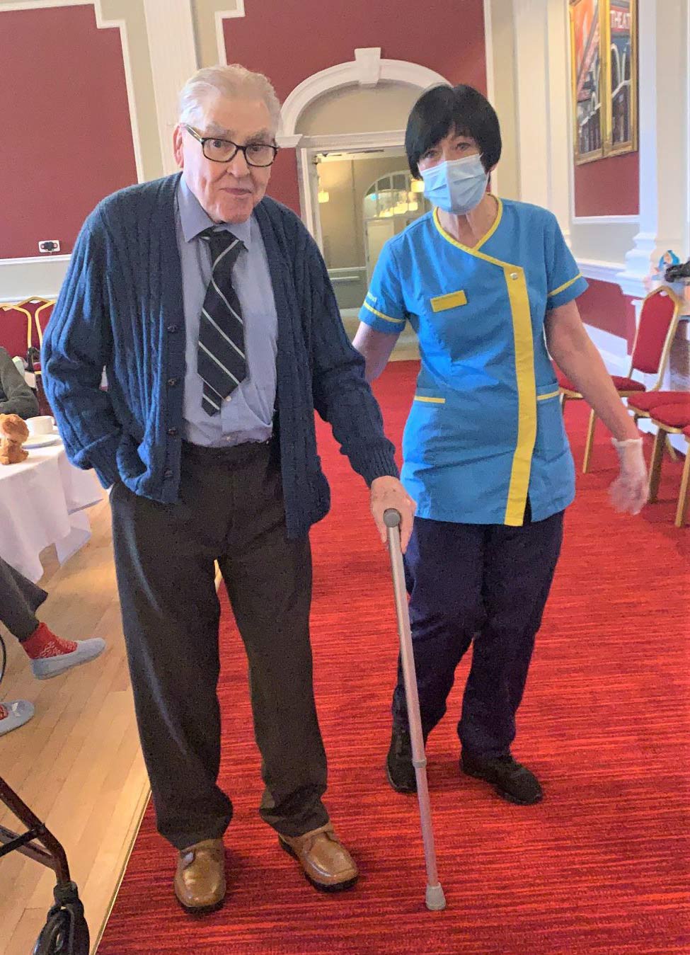 e-Granby-Resident-Leslie-doing-his-lap-of-the-ballroom-with-Carer-Janet