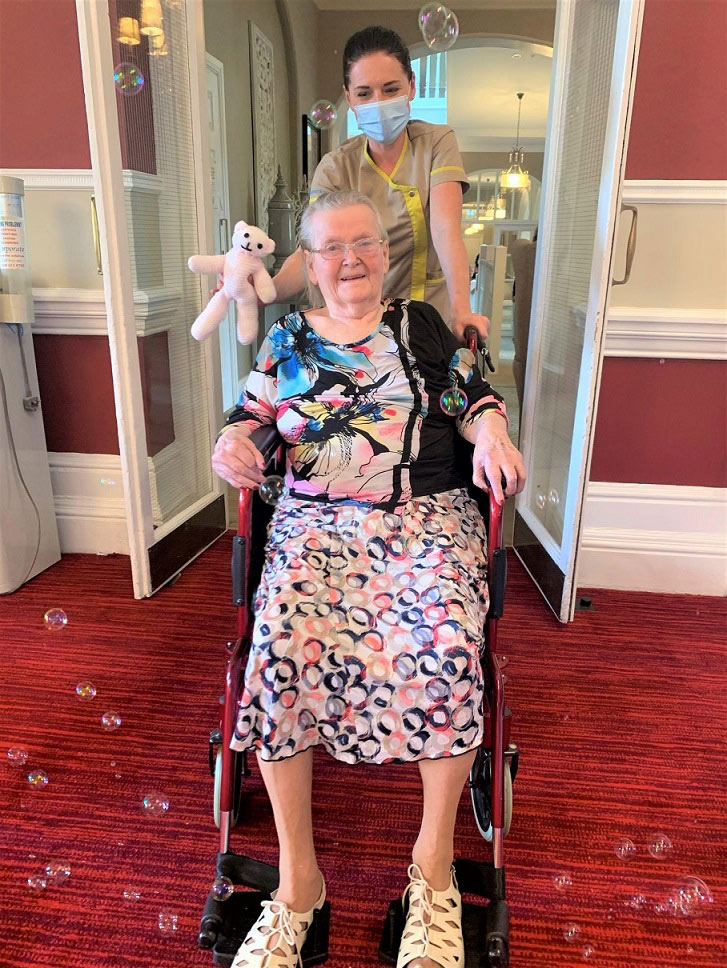 e-Granby-Resident-Wendy-and-team-member-Anna-on-their-lap-of-the-ballroom