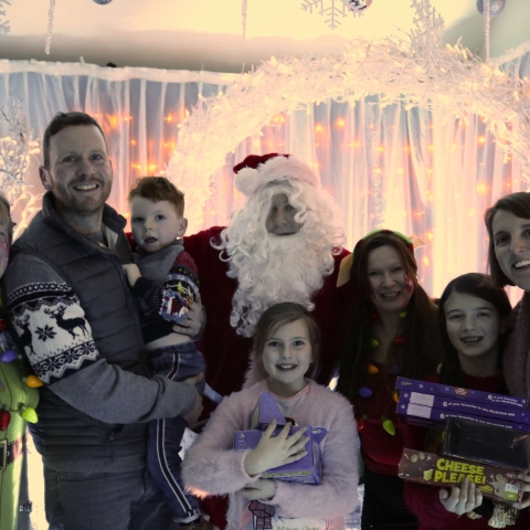 Felix and his family visit Santa’s Grotto at a Martin House Christmas party