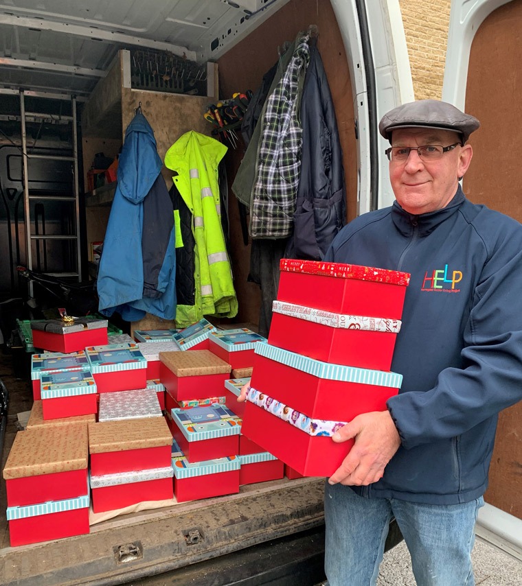 Andy Storr, Help at Home support worker with the Christmas gift boxes