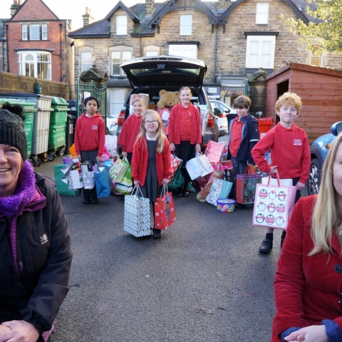 Catherine Crompton and Michelle Hayes of Resurrected Bites, along with some of the Weston Primary School children