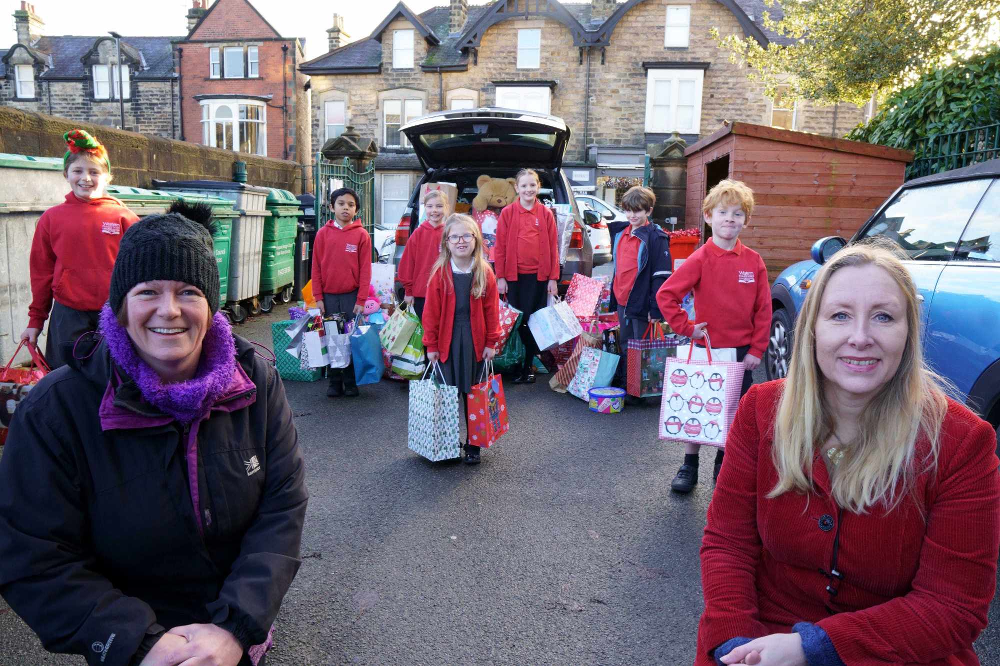 Catherine Crompton and Michelle Hayes of Resurrected Bites, along with some of the Weston Primary School children