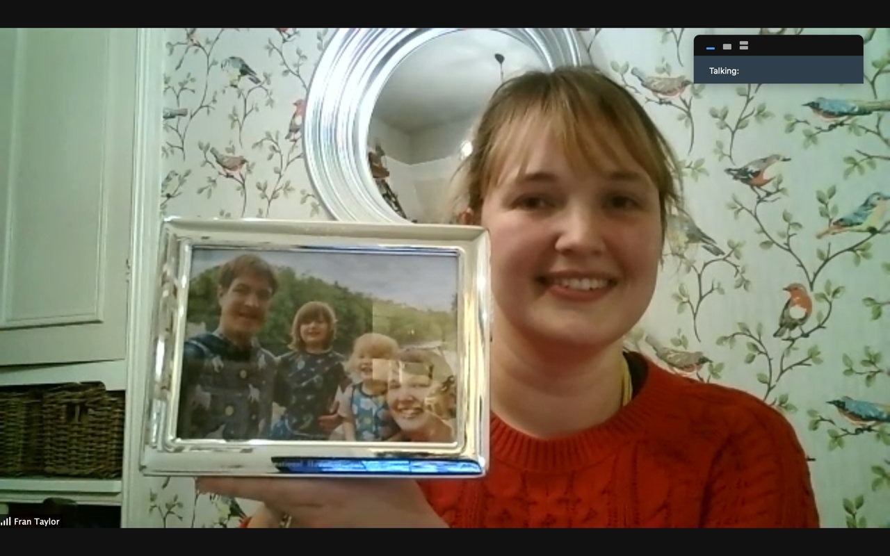 Fran Taylor show the Club members the Engraved Making a Difference Photoframe at the Zoom meeting