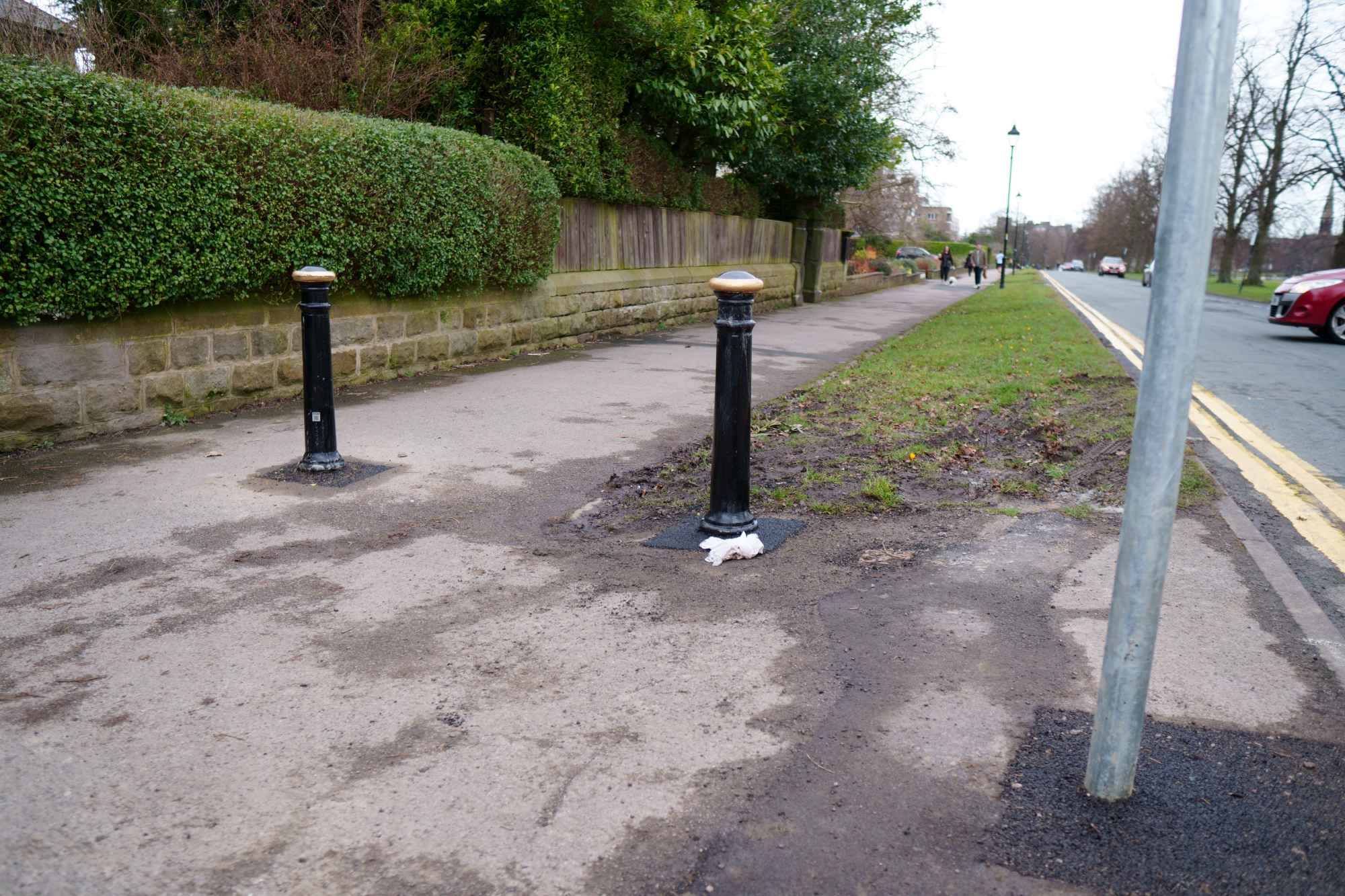 Additional bollards have been installed on the footpath to stop cars mounting the pavement: Beech Grove, Harrogate