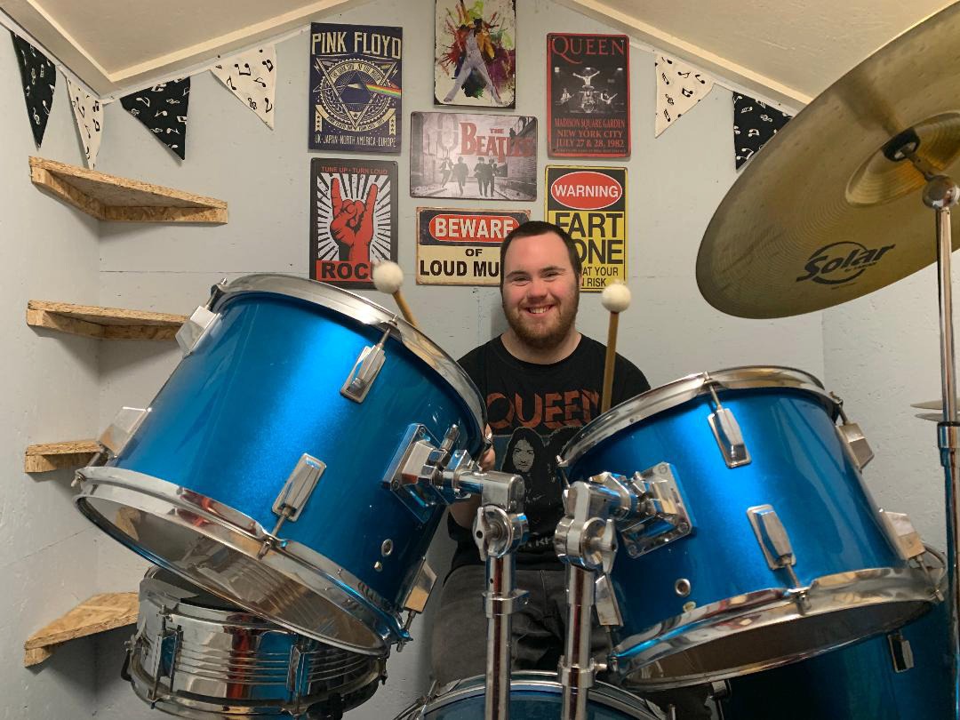 Joe Husband, a student at Henshaws Specialist College, is an avid Queen fan and has his own drumkit to practice his beats at home