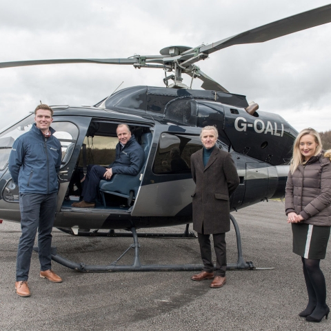 Celebrating the successful acquisition of Atlas Helicopters are, from left, Jack Schofield, Jason Schofield, James Towler and Emily Steed