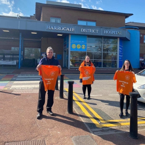 Gareth Sillifant (left) from HGS, Hannah Russell (Right) HGS and member of the fundraising team at HHCC (centre)