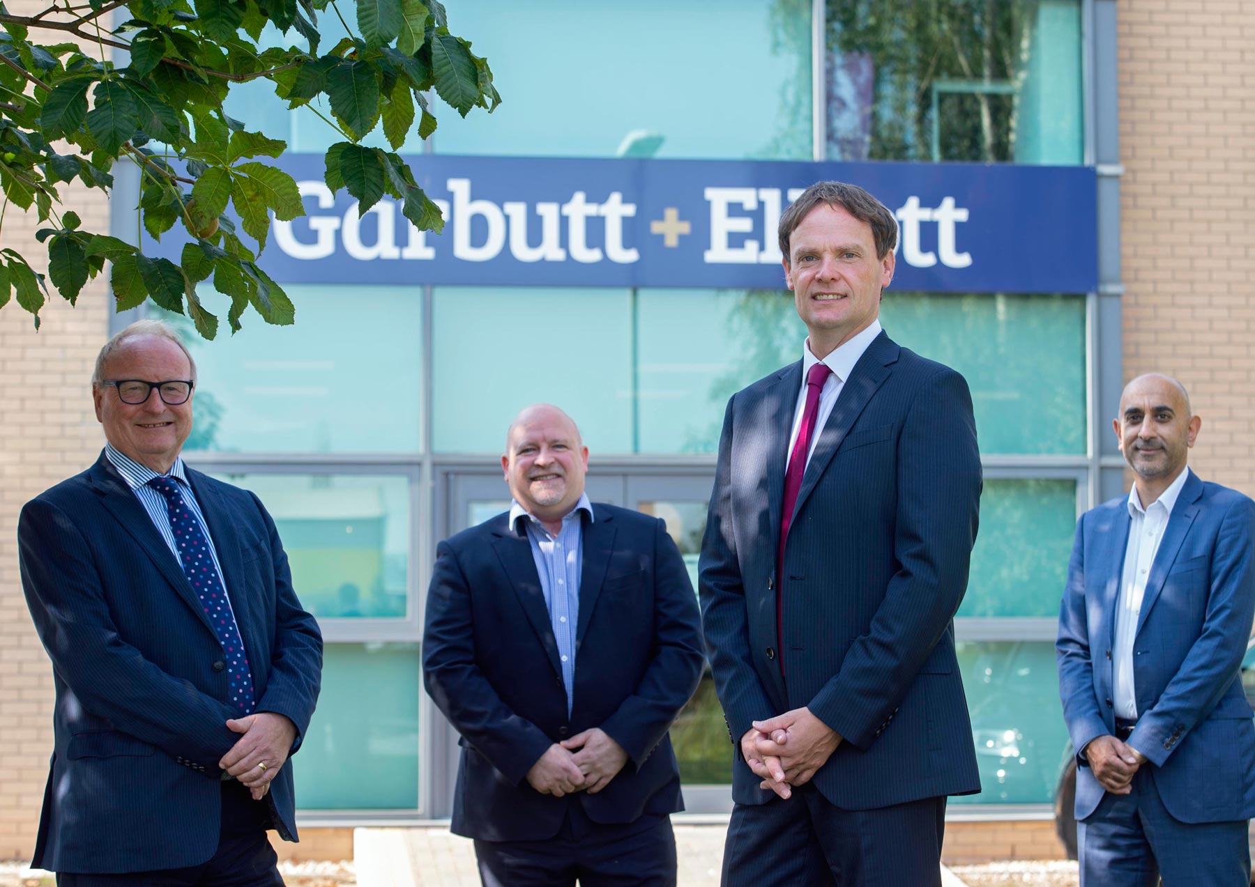 REEFSUCCESS: Pictured (L to R) are head of the Garbutt + Elliott corporate finance team, partner, Tony Farmer; managing partner, Russell Turner and corporate finance partners, Rob Burton and Tariq Javaid, outside the firm’s headquarters in York.