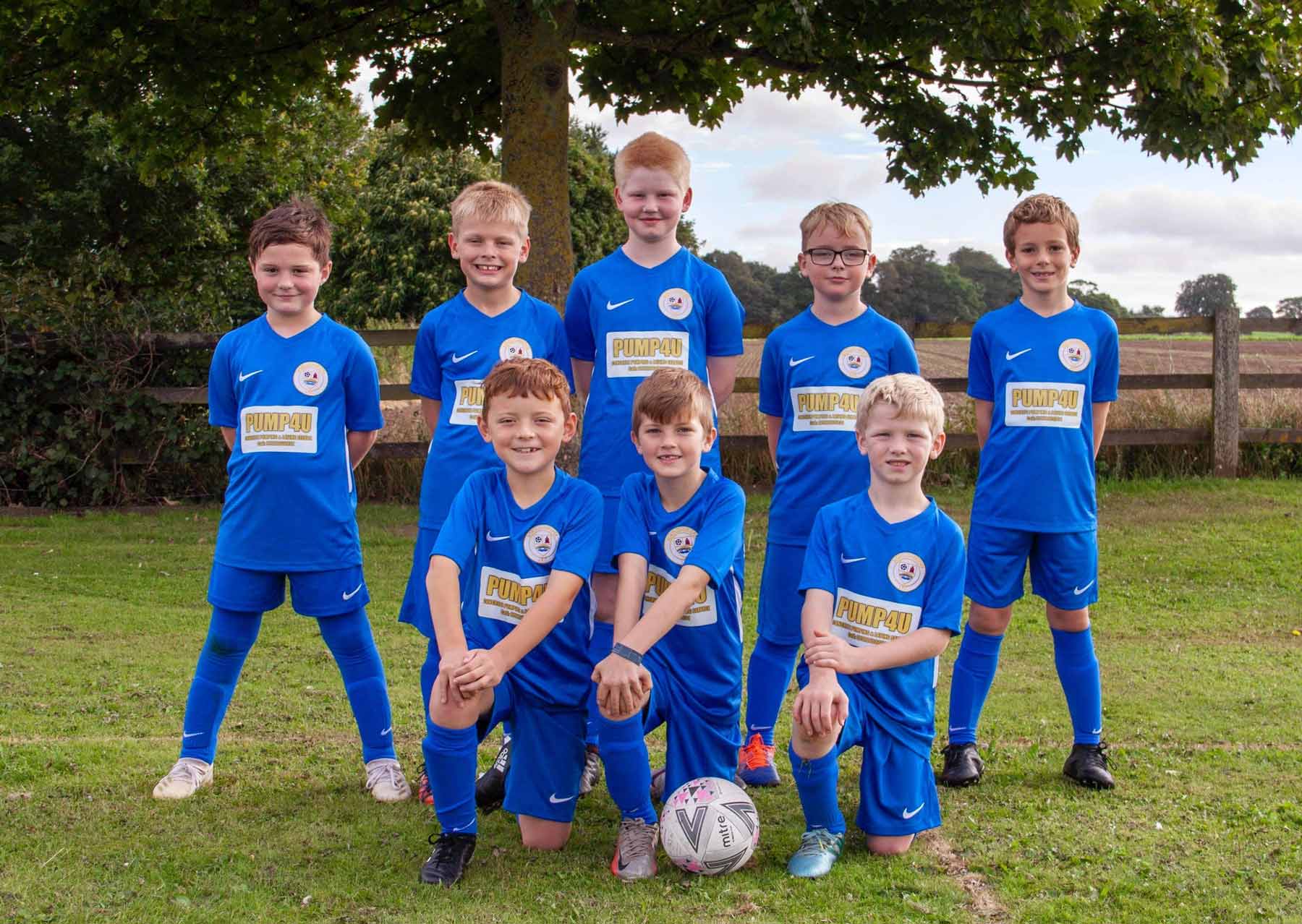 Boroughbridge Juniors FC Under 9 Boys wearing their new kit sponsored by Pump4U