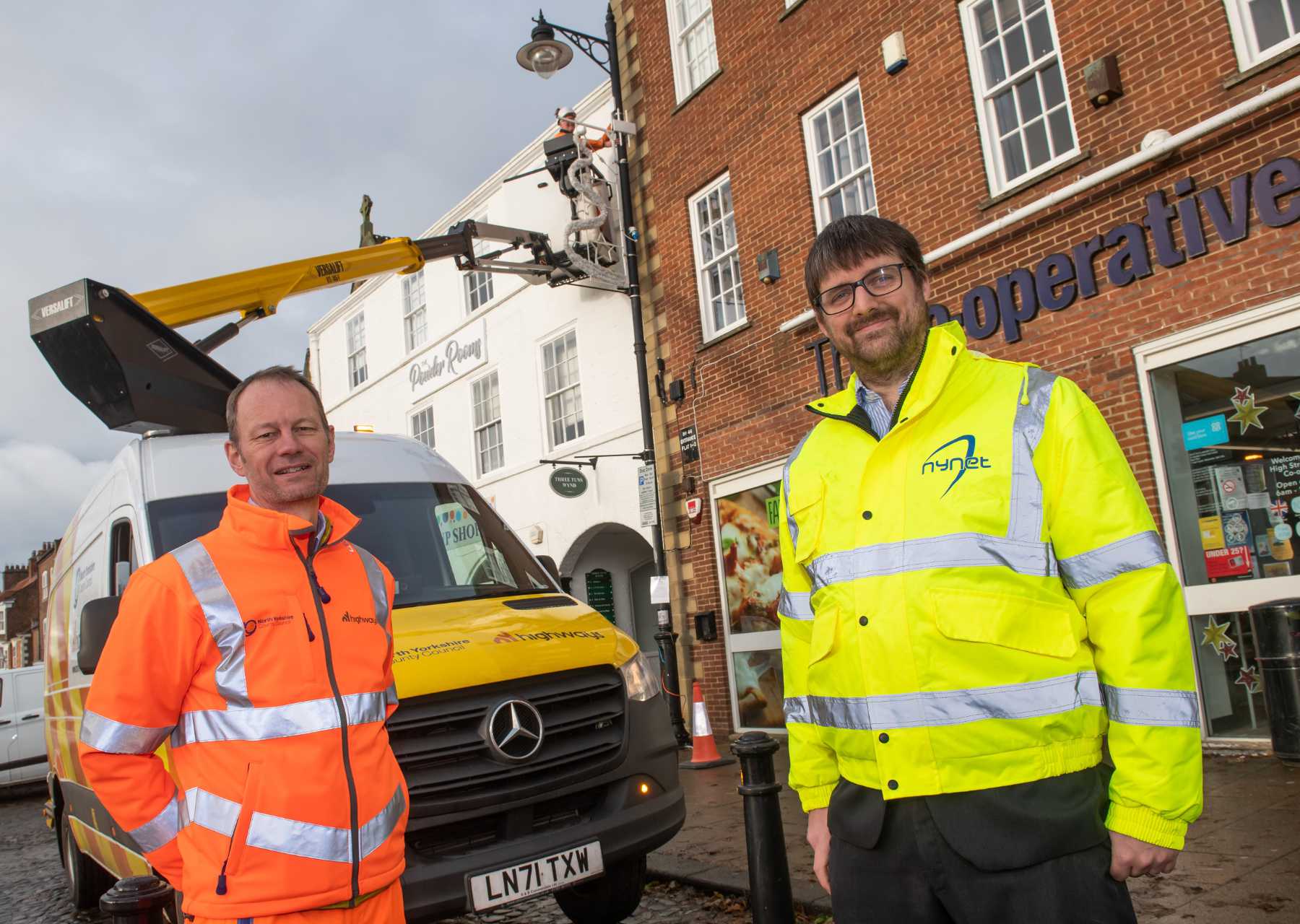 Richard Whitaker, Business Manager at NY Highways (left) and Alastair Taylor, Deputy Chief Executive at NYnet (right) at the Stokesley installation
