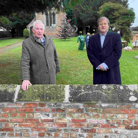 Churchwarden at St John’s, Minskip, Robert Beaumont, right, with David Armitage of York Handmade by the lovingly restored church wall