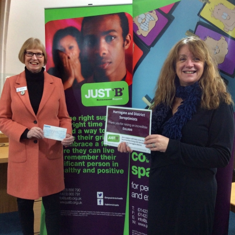 President of Soroptimist International of Harrogate and District, Sandra Frier (left) presents Sandra Gilbert, Community and Challenge Events Fundraiser for Just’B’ with a cheque for over £11000