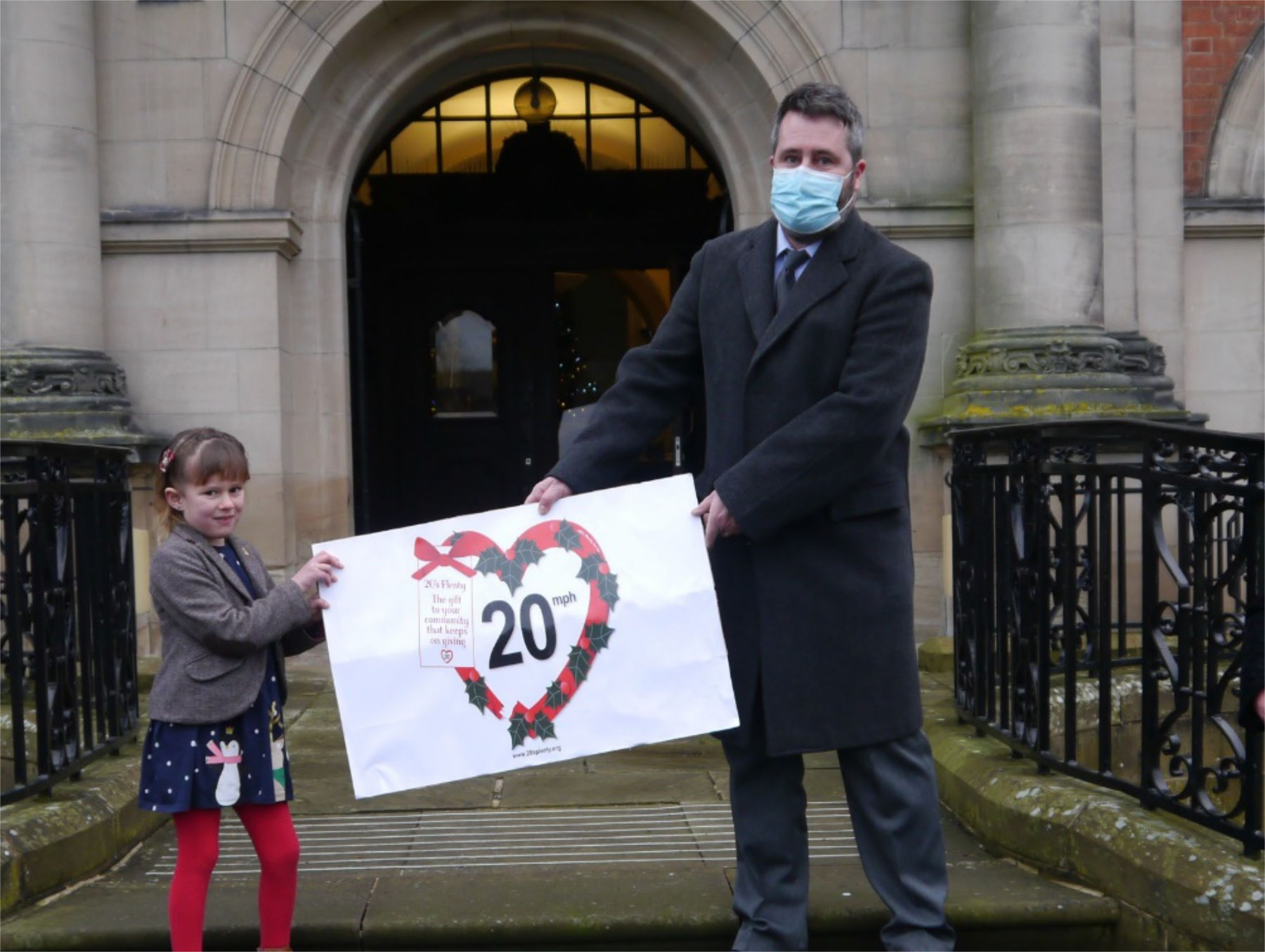Last month, Poppy (aged 6) presented a Giant 20mph Christmas Card to Daniel Harry of Democratic Services at NYCC, on behalf of 56 Town and Parish Councils supporting the 20s Plenty default 20mph campaign.